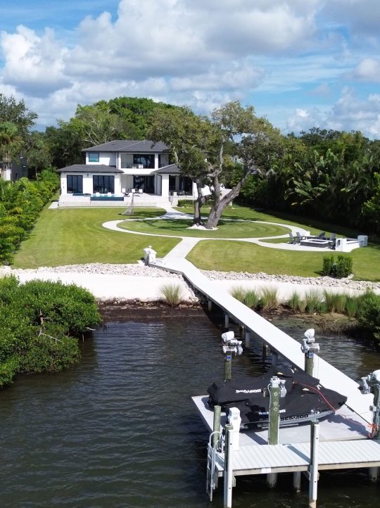 Aerial photograph of a luxurious Sarasota home in Bayshore Neighborhood, emphasizing outdoor amenities.